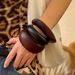 Melard Cut Wooden Bracelet With Fashionable Design And Metal Smooth Surface Bracelet_ipsvogv.com
