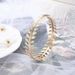 Fashionable And Personalized Gold Metal Leaf Serrated Armband Bracelet_ipsvogv.com