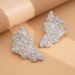 Cold Wind Liquid Metal Droplet Fashion Design Irregular Twist Earrings_ipsvogv.com