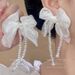 Unisex Super Fairy White Chiffon Romantic Crystal Bow Beaded Tassel Earrings Niche Design High End Temperament Earrings_ipsvogv.com