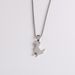 Cartoon cute little dinosaur pendant titanium steel necklace ins men and women personality simple pendant long sweater chain accessories_ipsvogv.com