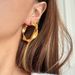 Electroplated Titanium Steel Retro Embossed Twist Large Earrings_ipsvogv.com