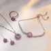 Titanium Steel Necklace Women's Korean Edition Ins Fashion Three Piece Set of Rotating Earrings Ring Super Sparkling Micro Set Zircon Clavicle Chain_ipsvogv.com