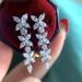 Cao Shi Jewelry High Grade Horse Eye Zircon Butterfly Sweet Temperament Long Flower Earrings Female_ipsvogv.com