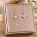 Cupid Angel's Wings Tassel Love Pendant Titanium Steel Necklace Women Can Move Small Wings Collar Chain_ipsvogv.com