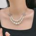 Empress Dowager Xi, full of diamonds, bow and pearl patchwork, Saturn earrings, light luxury, high-end sense,_ipsvogv.com