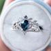 Sanjie Flower Shaped Inlaid Water Droplet Blue Zircon Ring, Female Niche High-end Crown Accessory_ipsvogv.com