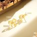 Hot Sale In Real Gold Brass Electroplating Creative Fashion Versatile Flowing Three Dimensional Bow Earrings_ipsvogv.com