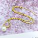 New Titanium Steel Gold Millet Pearl Collarbone Necklace For Women's Light Luxur And Niche High-end Design Sense_ipsvogv.com