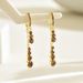 Fashionable commuting style women's inlaid ear, niche high-end sense, multi-layer tassel ear buckles, versatile_ipsvogv.com