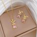 【 Titanium Steel 】 Necklace Earring Light Luxury Curved Rabbit Full Diamond Personalized Temperament Banquet Earrings_ipsvogv.com