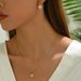 Fashionable and minimalist Korean version women's inlaid zircon necklace earring set with personalized clover design_ipsvogv.com