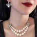 Empress Dowager Xi, full of diamonds, bow and pearl patchwork, Saturn earrings, light luxury, high-end sense,_ipsvogv.com