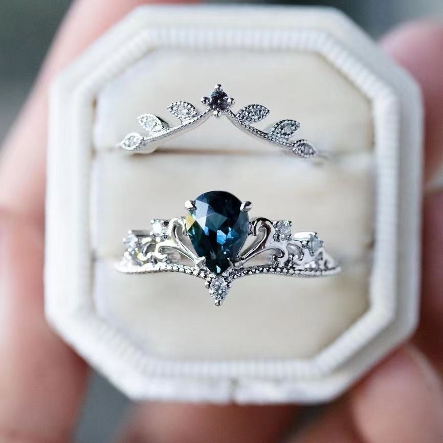 Sanjie Flower Shaped Inlaid Water Droplet Blue Zircon Ring, Female Niche High-end Crown Accessory_ipsvogv.com