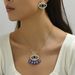 Instagram versatile hip-hop style women's earring necklace set with personalized devil's eye diamond design earrings and_ipsvogv.com