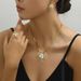version of Korean style fresh and sweet women's earring necklace set, personalized flower exaggerated design, index_ipsvogv.com