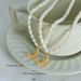 French Niche Personality Ins Cool Style Pleated Texture Moon Pendant Collarbone Chain Titanium Steel Freshwater Pearl_ipsvogv.com