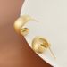 Small gold bean stud earrings frosted electroplated gold plated earrings female niche versatile high-grade stud earrings_ipsvogv.com