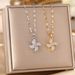 the Same Type Of Four Leaf Windmill Rotary Pendant Titanium Steel Lock Bone Chain Versatile Non Fading Necklace_ipsvogv.com