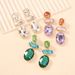 E9626 diamond studded exude a gentlemanly socialite style, with exaggerated contrasting color and multi cut earrings_ipsvogv.com