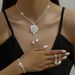 FLORAL RADIANCE - Rhinestone Bridal Jewelry Set (Dazzling Floral Necklace & Earrings, Wedding Dress Accessories)_ipsvogv.com