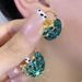 Women's earrings Emerald Crystal Flower Basket Earrings 2023 New High-end Fashion Versatile Earrings Silver Needle Earrings_ipsvogv.com