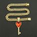 Trendy men trendy women, cool red heart key shaped pendant necklace with large buckle and diamond inlaid Cuban chain_ipsvogv.com