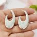 Trendy U-shaped earrings for women with gold oval stud earrings_ipsvogv.com