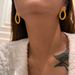 Real Gold Electroplated Titanium Steel Irregular Hollow Embossed O Shaped Gold And Silver Earrings_ipsvogv.com
