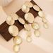 Exaggerated Geometric Texture Oval Fashion Metal Long Tassel Earrings For Women_ipsvogv.com
