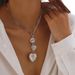 Metal Micro Inlaid Zircon Peach Heart Eye Pendant Necklace Ins Cold Wind Love Chain Ornament_ipsvogv.com