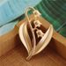 White orange tea, lily of the valley high-end exquisite women's electroplated matte gold brooch, niche design, elegant_ipsvogv.com