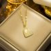 Micro inlaid cat's eye stone full of diamonds, love and color resistant titanium steel necklace, simple and fashionable_ipsvogv.com