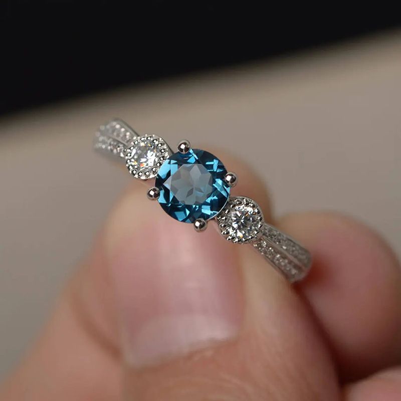 Cao Shi's New Sea Blue Proposal Engagement Jewelry Simple Couple Wedding Ring_ipsvogv.com