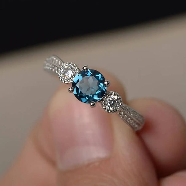 Cao Shi's New Sea Blue Proposal Engagement Jewelry Simple Couple Wedding Ring_ipsvogv.com