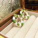 New exaggerated drop glazed earrings with circular contrasting color design, high-end and niche ear accessories_ipsvogv.com
