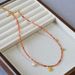 French Niche Design, Artistic Red Bead Asymmetrical Gold Coin Pendant, Simple Temperament Necklace, Collarbone Chain_ipsvogv.com