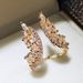Cao Shi's hot selling exaggerated horse eye diamond angel wing Ring Earring Jewelry adjustable women's ring_ipsvogv.com