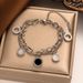Designer Round Black And White Shell Roman Numerals Bracelet With Titanium Steel Plating Double-layer Hollow Design Fashionable_ipsvogv.com
