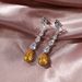 Cao Shi's Korean Edition New Pear Water Drop Shaped Zircon Long Tassel Fashion Women's Earrings_ipsvogv.com