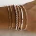 Chic And Cool Alloy Six-piece Bracelet Set, A Stylish And Personalized Bracelet Ensemble That Unlocks New Combinations Of Individuality And Fashion._ipsvogv.com