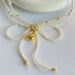 2024 New Japanese Korean Niche Fashion Design, High-end And Sweet Neck Collarbone Chain, Pearl Bow Necklace, Female_ipsvogv.com