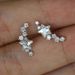 Cao Shi's earrings are copper plated with gold, shining with curved stars, versatile women's earrings_ipsvogv.com