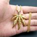 Hip Hop Jewelry Titanium Steel Color-Retaining Gold-Plated Jamaican Reggae Maple Leaf Pendant_ipsvogv.com