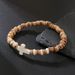 Hot Selling Coconut Shell Wood Chips Pine Stone Cross Men Hip Hop Handmade Beaded Elastic Wooden Bracelet_ipsvogv.com