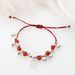 Hot Selling Handmade Ethnic Wind Chime Bell Lucky Character Pendant With Adjustable Red Rope Bracelet_ipsvogv.com