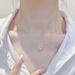 2024 Summer New Korean Edition Titanium Steel Small Form Design Cute Hollow Bow Pendant Necklace Collar Chain_ipsvogv.com