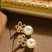 French Elegant Personalized Hollow Out Five Petal Flower Pearl Pendant For Women With A Sense Of Luxury And Temperament,_ipsvogv.com