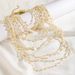 Fashion blogger same bead necklace Bohemian holiday style multi layer irregular shell necklace_ipsvogv.com