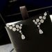 Cao Shi Shakes the Voice to Live the Super Flashing Zircon White Gold Wings Water Drop Earrings Female Dinner Party Luxurious Diamond Earrings_ipsvogv.com